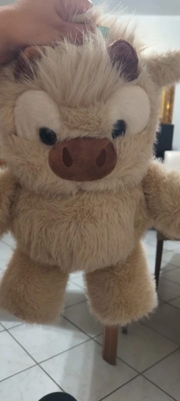 Customer photo review of MooDash BoopJoy – La vaquita de peluche que corre