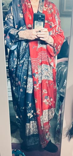 Customer's Plus Size Spliced Floral Print Vintage Tencel Dress shown in a mirror selfie as a casual robe.