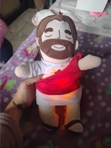 Customer photo review of Breathing Jesus Plush for Sleep Better