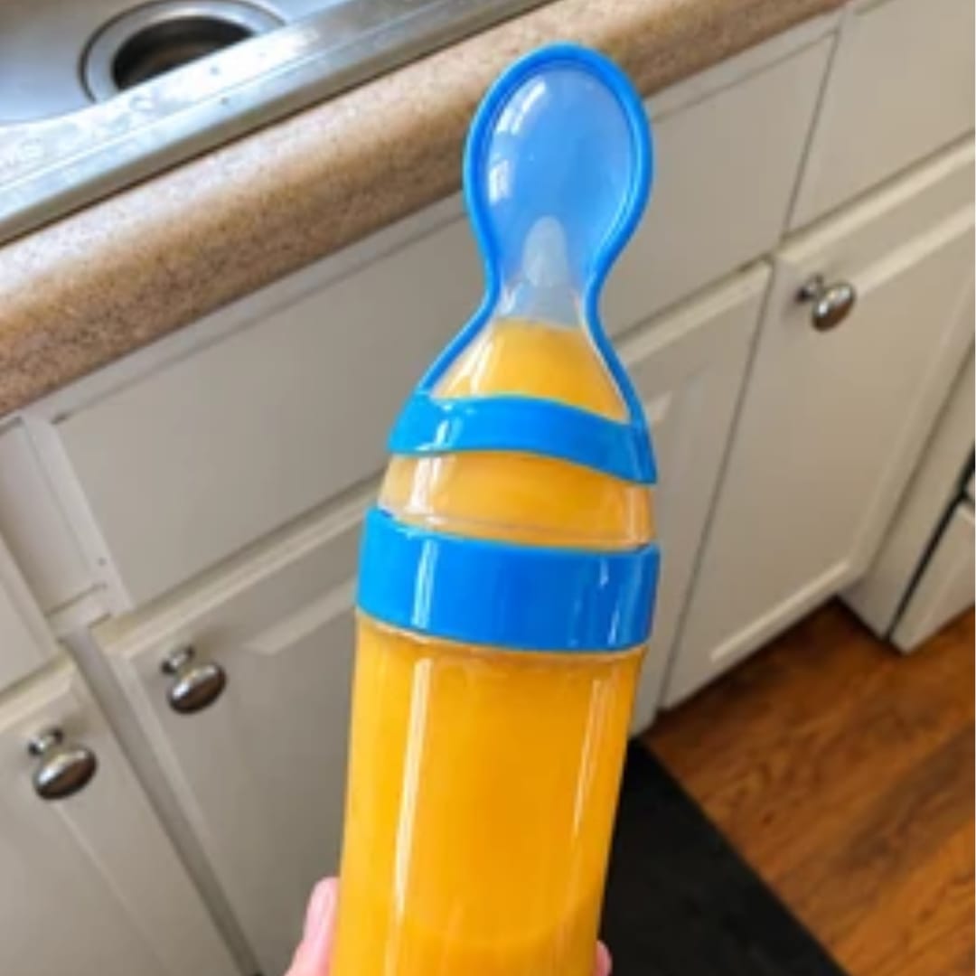Customer photo review of Biberón cuchara para papillas sin manchas