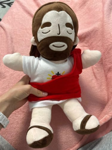 Customer photo review of Breathing Jesus Plush for Sleep Better