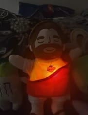 Customer photo review of Breathing Jesus Plush for Sleep Better