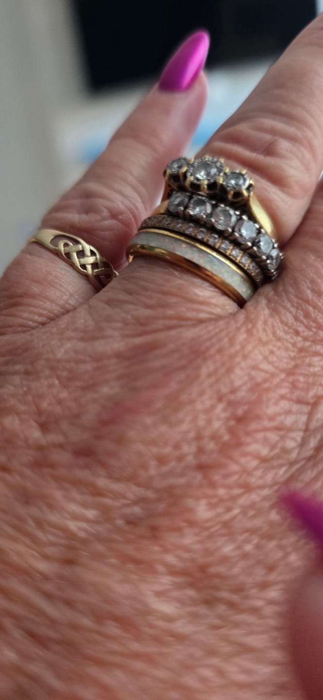 Customer photo review of The Golden White Opal 4mm Wonder Ring
