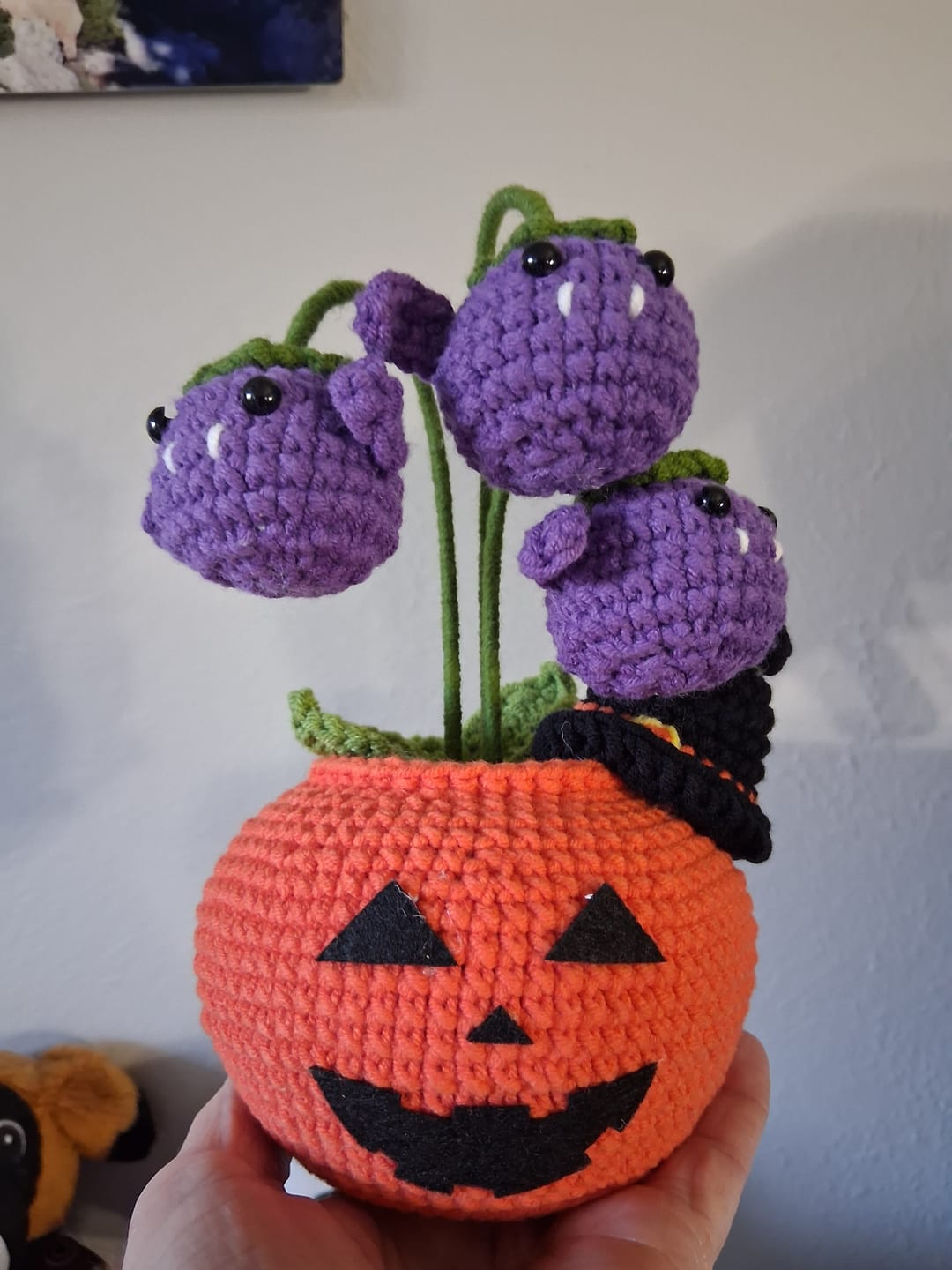 Customer photo review of Crochet Halloween Pumpkin Ghost Pot – Handmade Spooky Flower Pot, Gothic Desk Decor & Halloween Gift