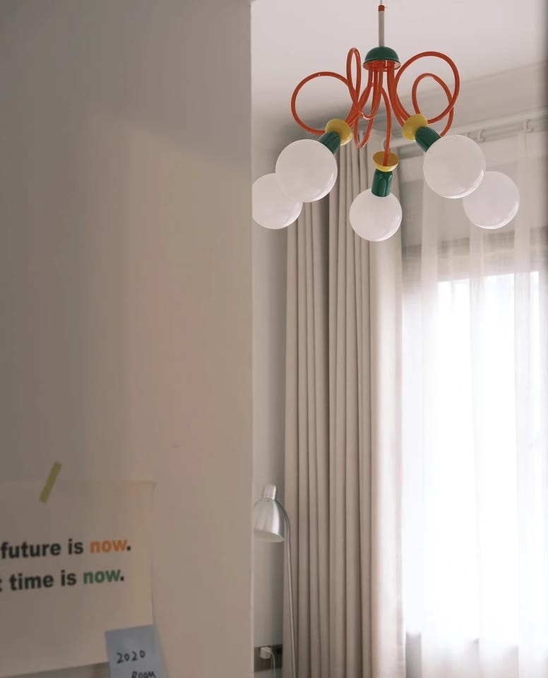 Customer photo review of Memphis Glass Pendant Lamp, Red Rings, Iron, Rounded Bulb