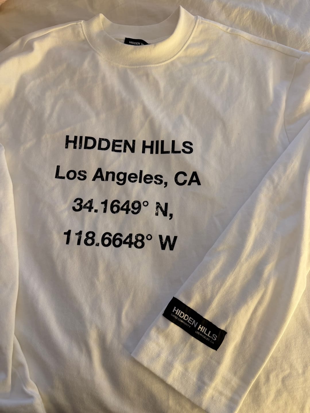 Customer photo review of VINTAGE LOGO LONGSLEEVE T-SHIRT WHITE