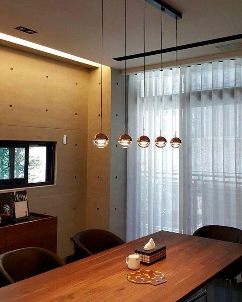 Customer photo review of Half Clear Glass Pendant Lamp, Tilting Shade, Integrated LED