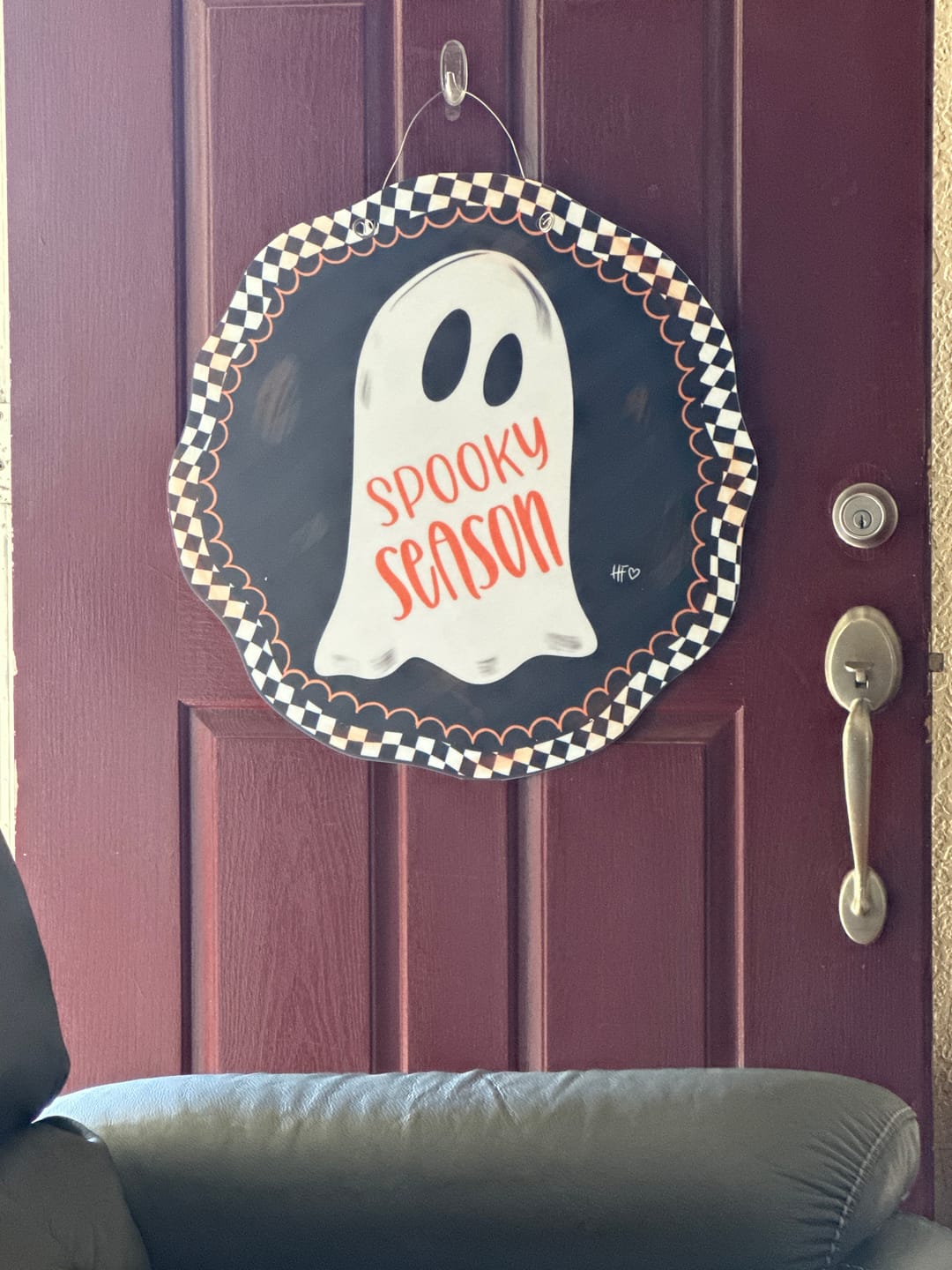 Customer photo review of Spooky Ghost Halloween Circle Door Hanger