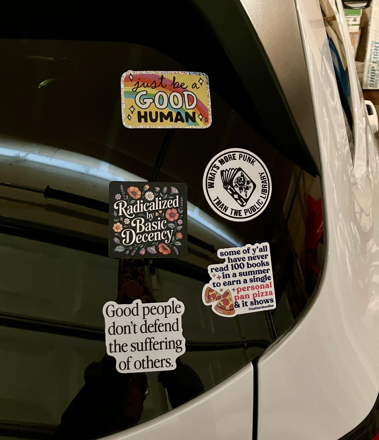 Customer photo review of Good  People Don't Defend The Suffering Of Others Sticker