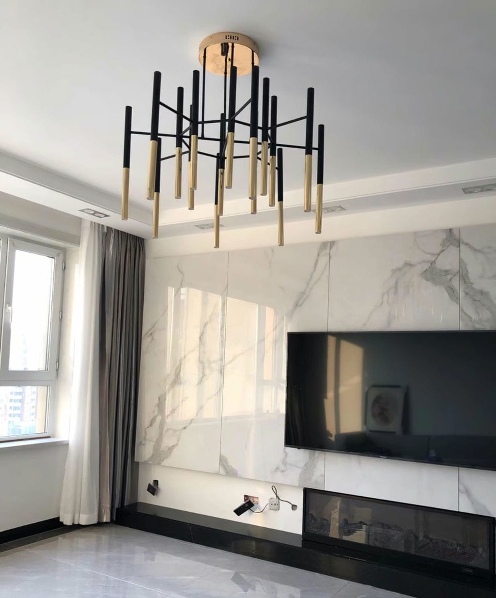 Customer photo review of Black Gold Tubular Chandelier, Metal Rods, 60 to 120 cm