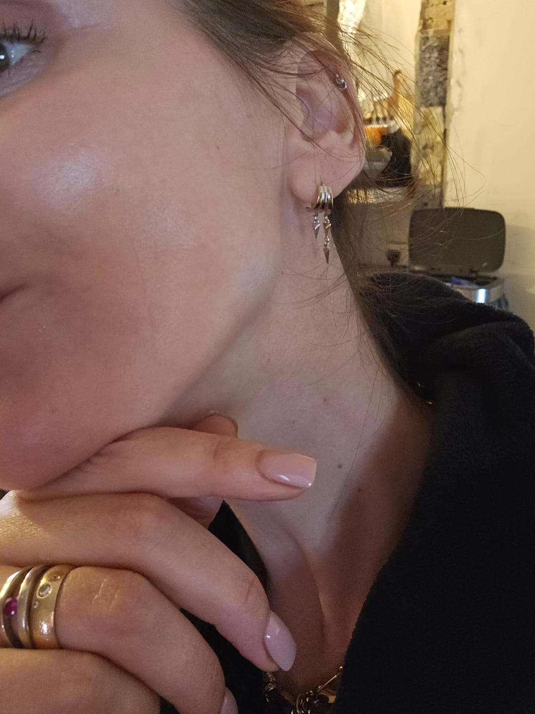 Customer photo review of Lynx Huggie Illusion Earrings - Mixed Metal