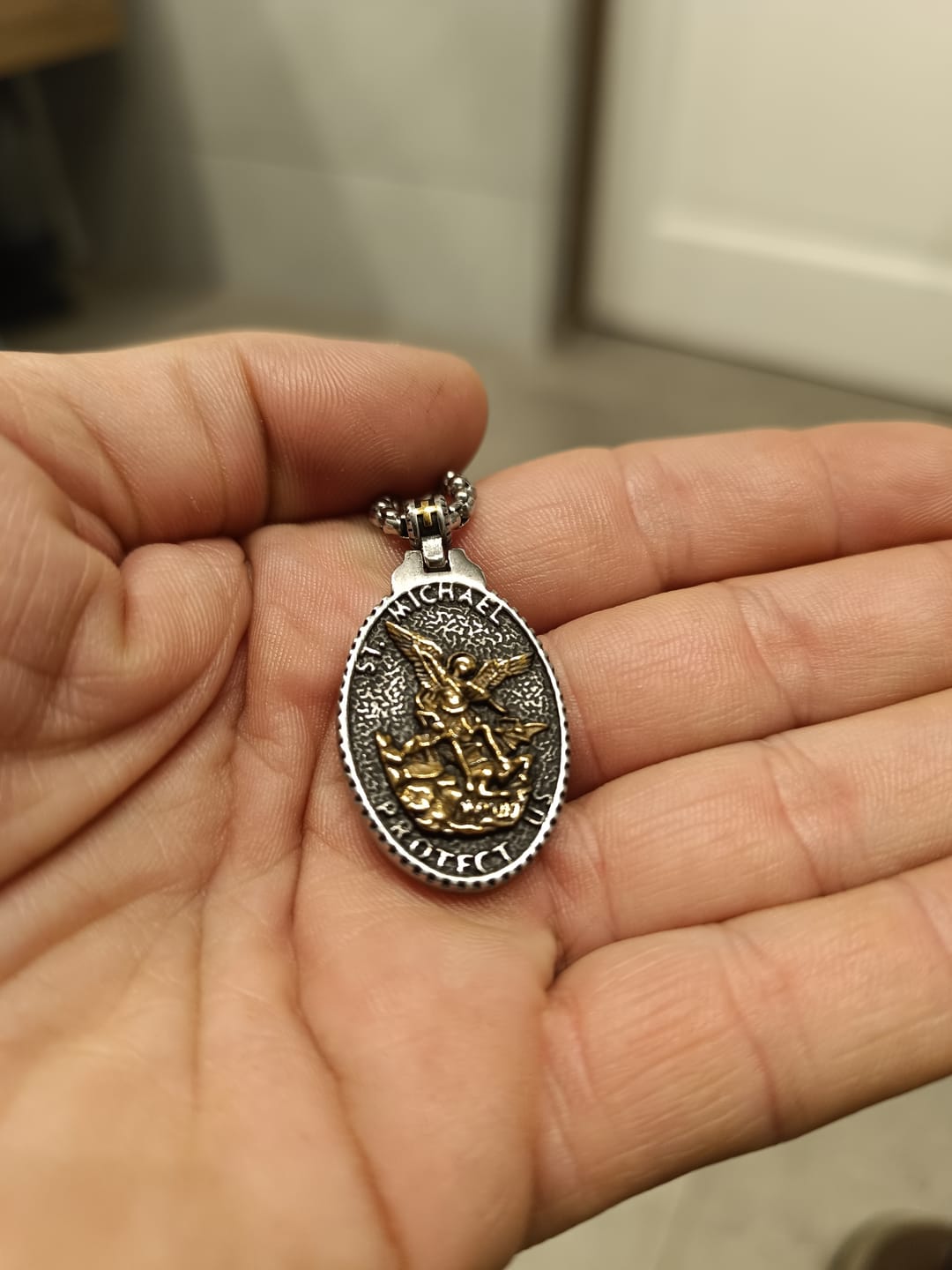 Customer photo review of ST. MICHAELS BADGE.