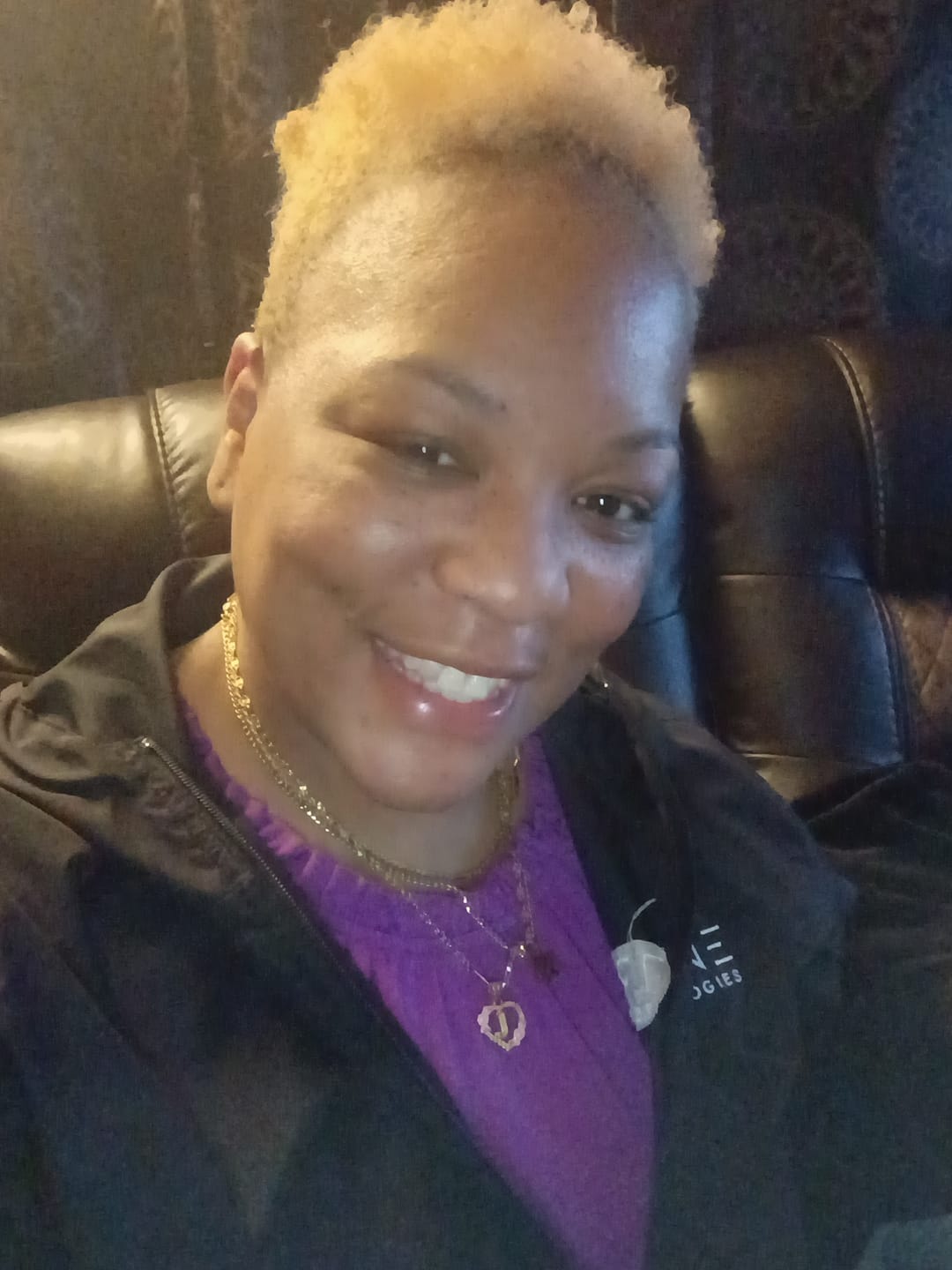 Customer photo review of Flower Initial Necklace w/ Clip Chain