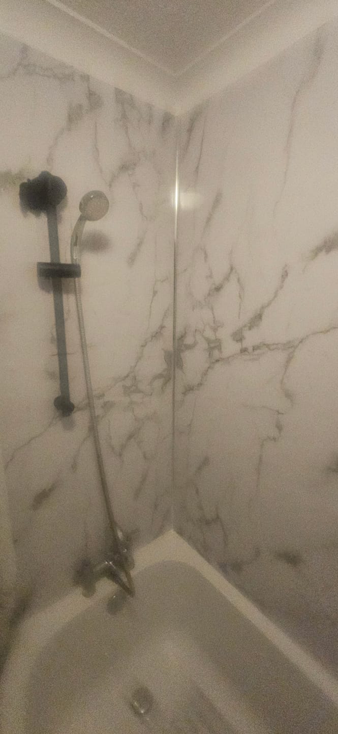 Customer photo review of Premium White Carrara Matt Shower Wall Panel – 1M x 2.4M