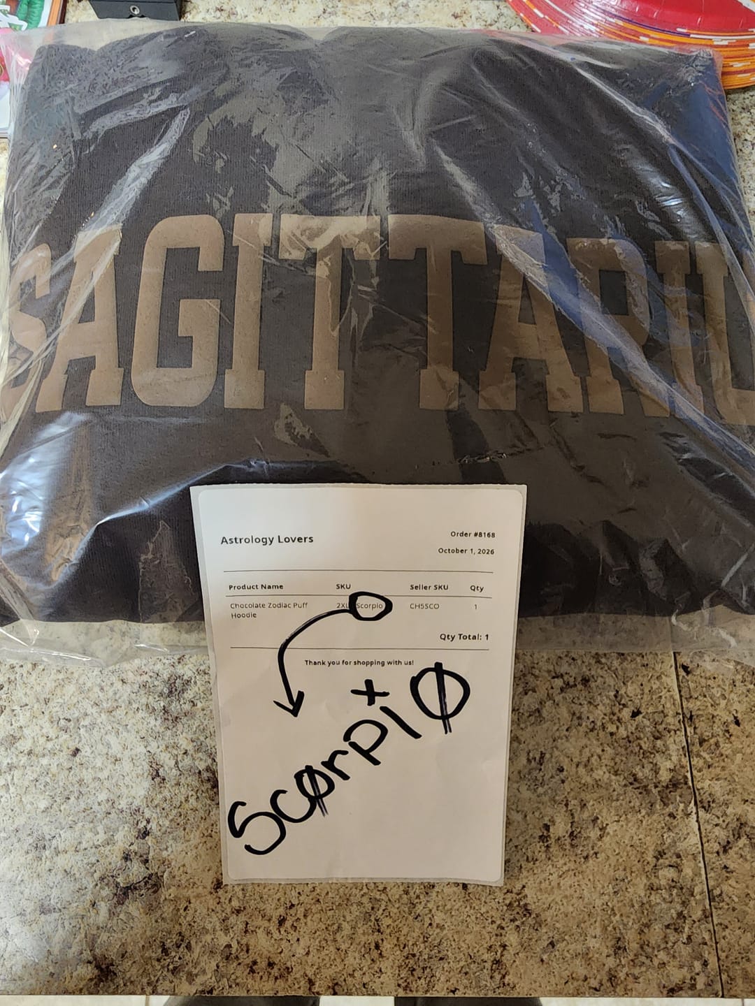 Customer photo review of Chocolate Zodiac Puff Hoodie
