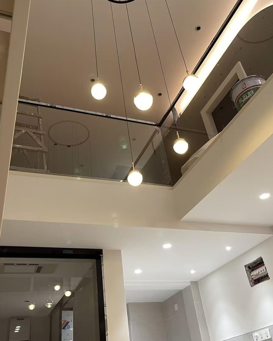 Customer photo review of Half Clear Glass Pendant Lamp, Tilting Shade, Integrated LED