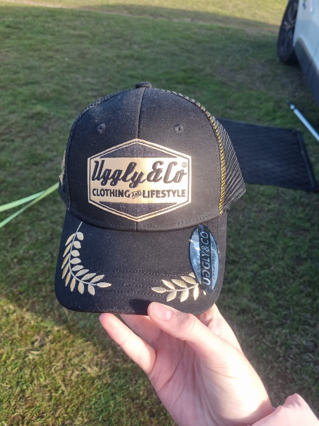 Customer photo review of Black & Gold 'Podium' Diamond Trucker Hat