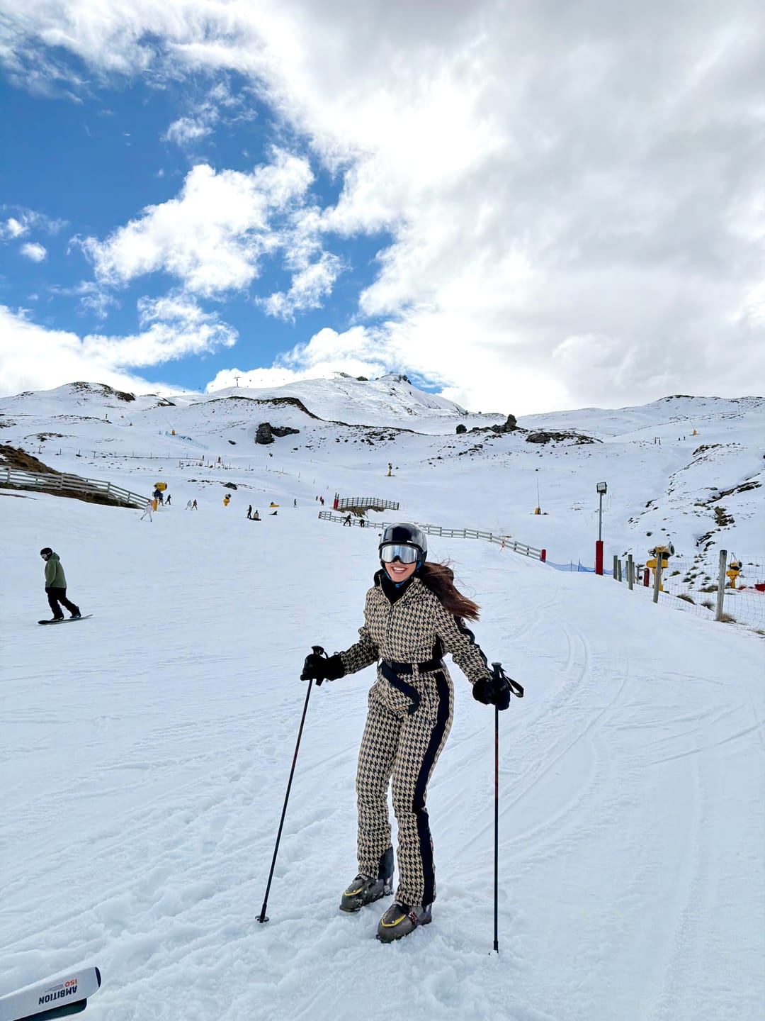 Customer photo review of Women's Slim-Fit Stretch Faux Fur Tan Houndstooth One-Piece Ski Suit