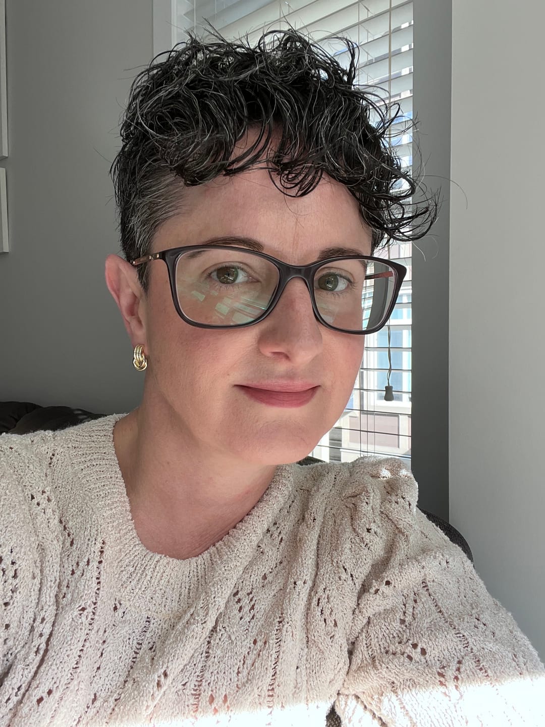 Customer photo review of Mini Twist Stud Earrings