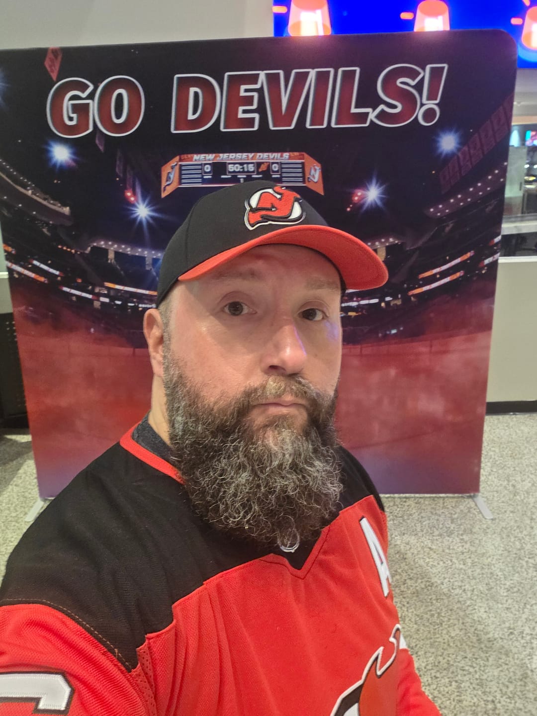 Customer photo review of Men's New Jersey Devils Jack Hughes #86 Red Home Premium Jersey