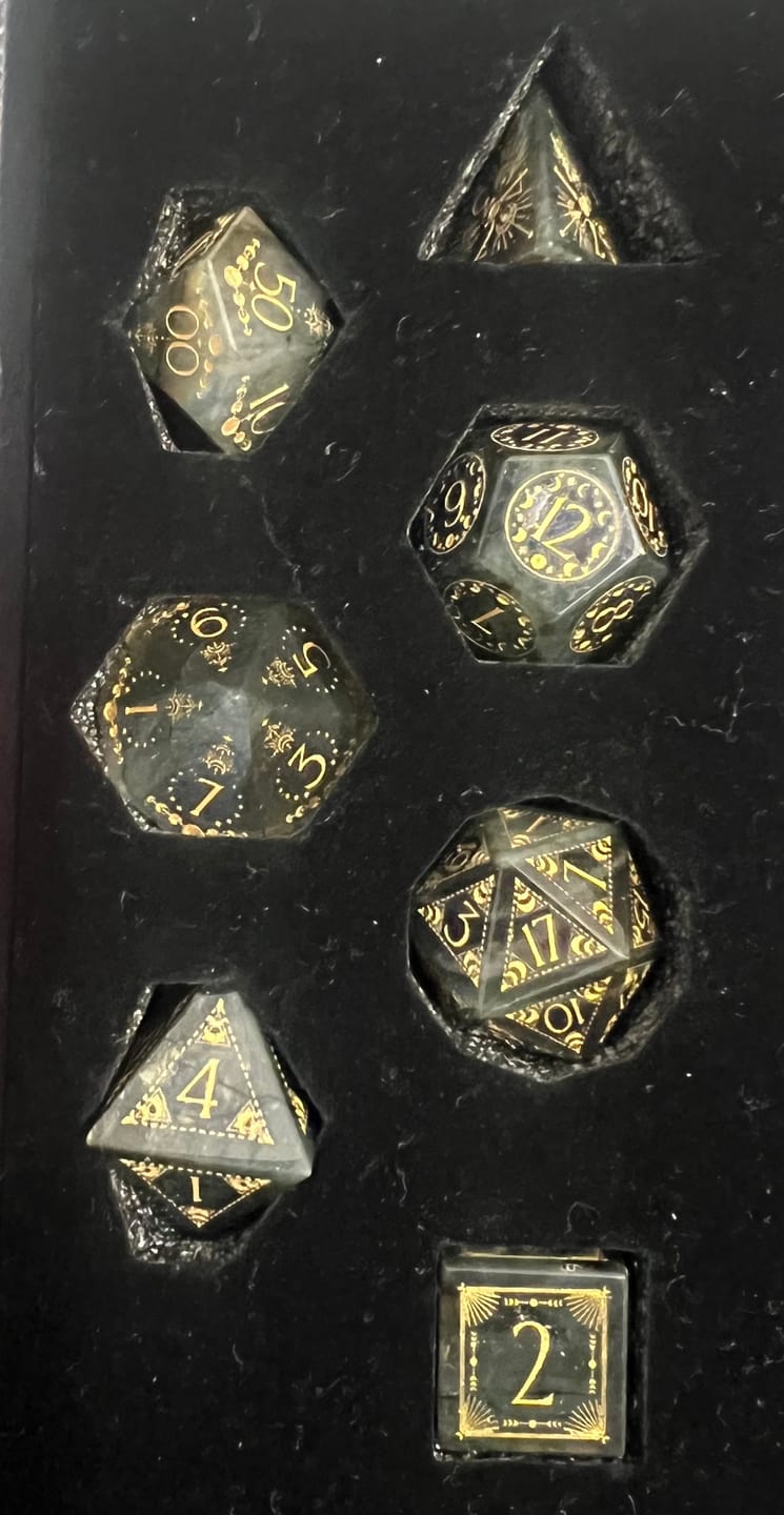 Customer photo review of URWizards D&D Labradorite Engraved Dice Set Lunar Eclipse