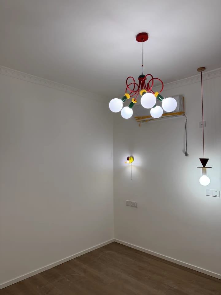 Customer photo review of Memphis Glass Pendant Lamp, Red Rings, Iron, Rounded Bulb