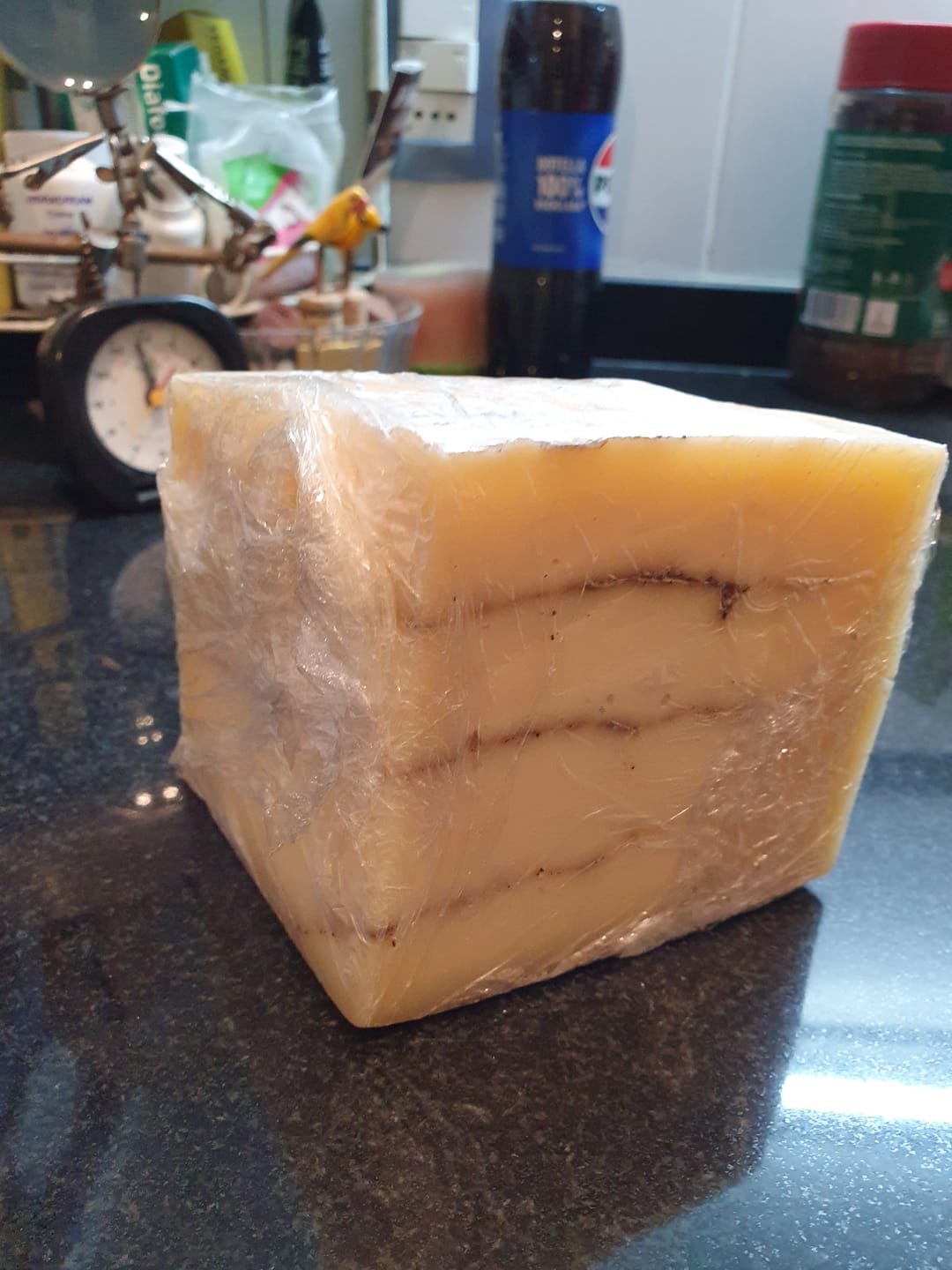 Customer photo review of Queso Sardo, con pimienta, artesanal.