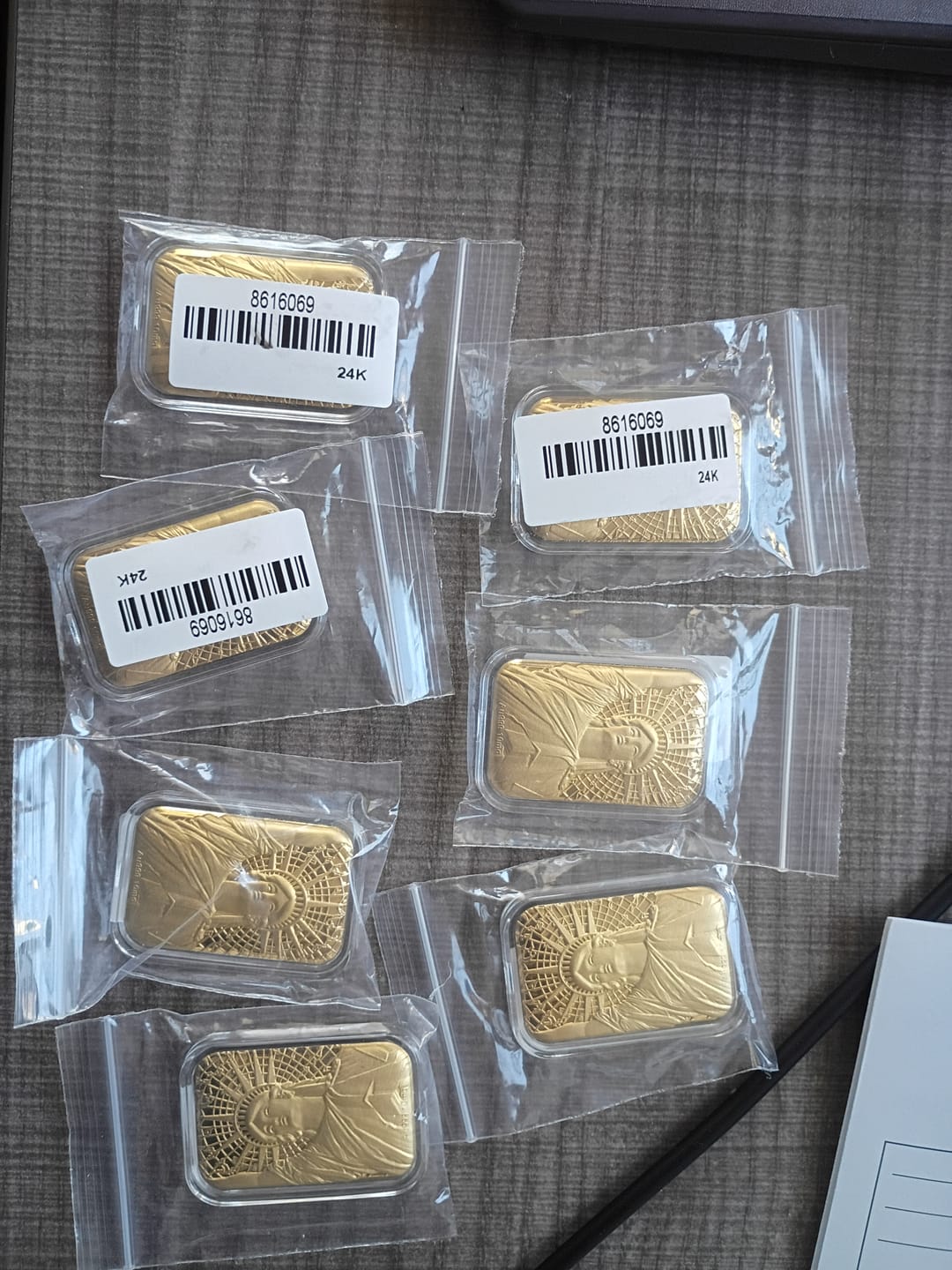 Customer photo review of 24K Yellow Gold (99.99% Pure Gold) Statue of Liberty Gold Piece