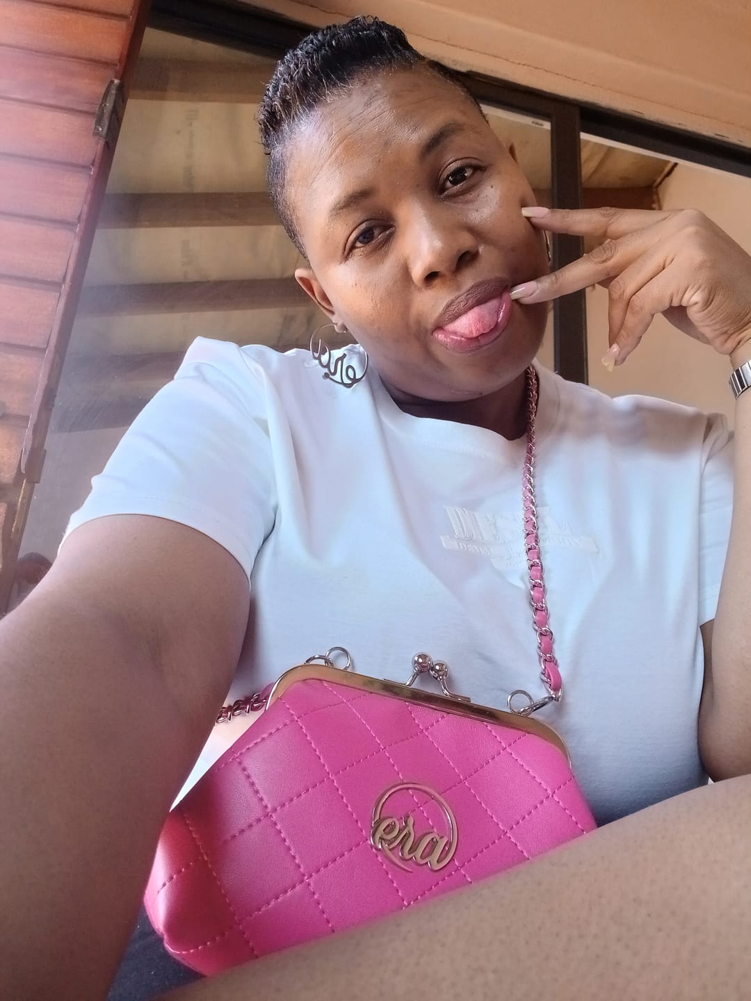 Customer photo review of ERA Mini Kisslock Chain Bag – Pink