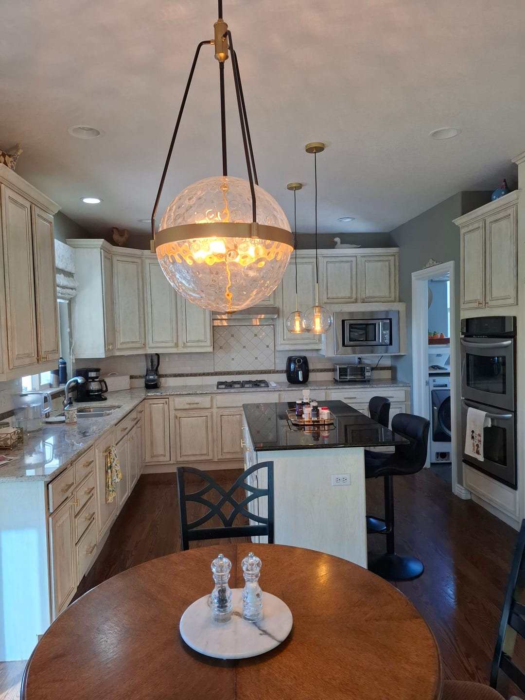 Customer photo review of 4-Light Water Hammered Glass Sphere Pendant