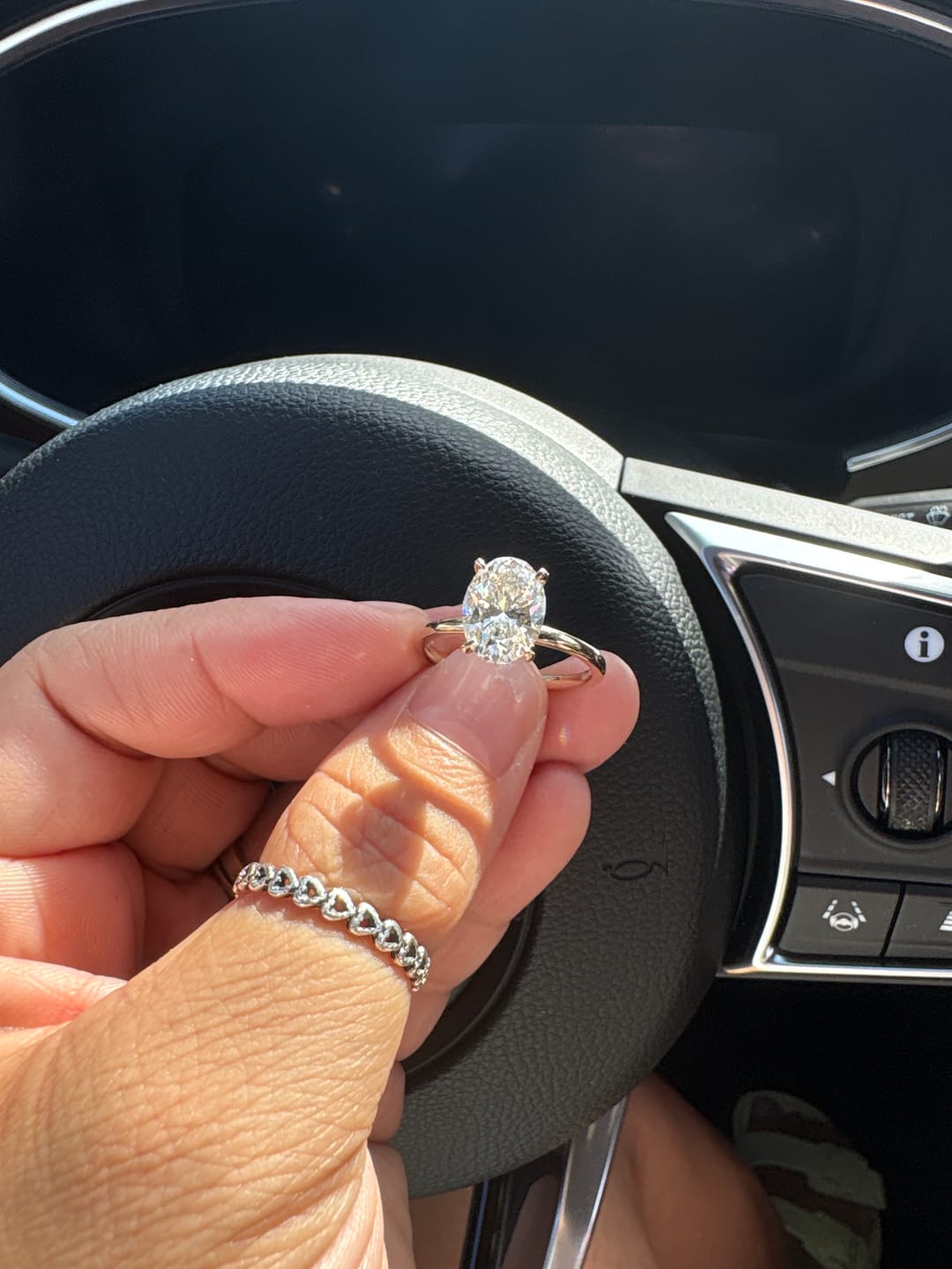 Customer photo review of 2ct IGI Certified Oval Lab-Grown Diamond Ring with Hidden Halo & Claw Setting in Solid 14K Yellow Gold (Includes IGI Certification from International Gemological Institute)