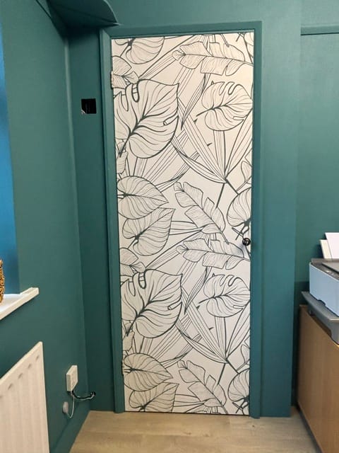 Customer photo review of Juniper Dark Green - Tropical Dark Green Leaves Wallpaper