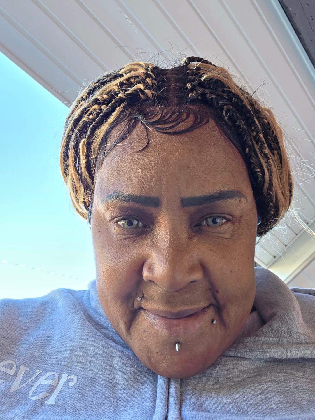 Customer photo review of Michelle - Salon-Style Glueless Miracle Braided Wig Pre-Bleached Swiss HD Full Lace Boho Box Braids Bora Bora Human Hair Body Wave Curls