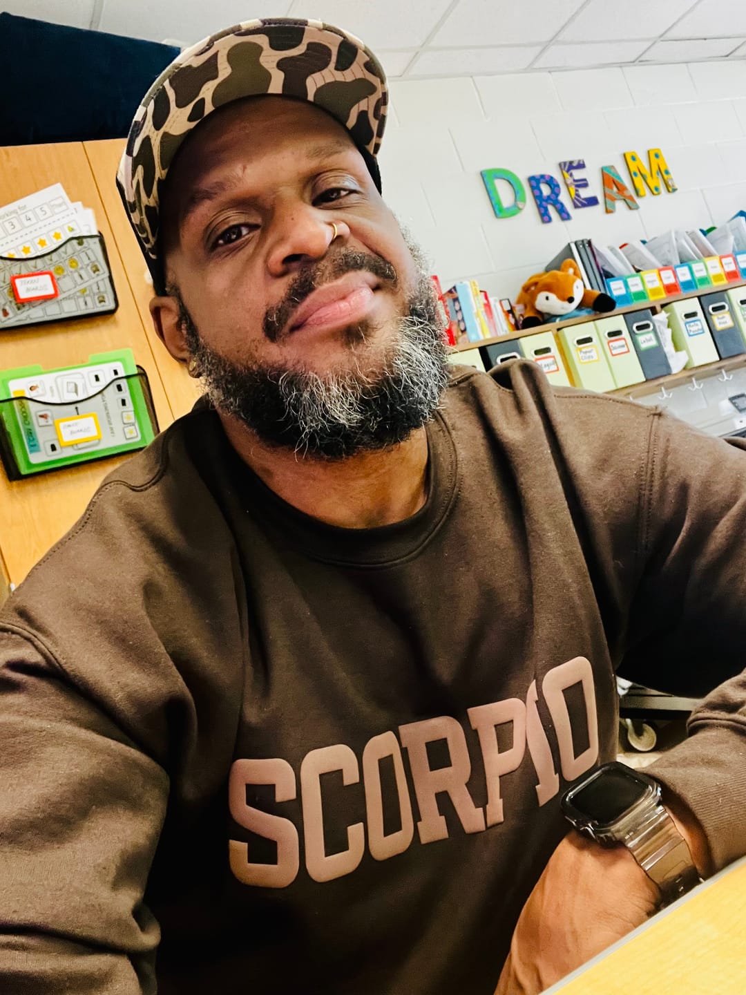 Customer photo review of Chocolate Zodiac Puff Print Crewneck