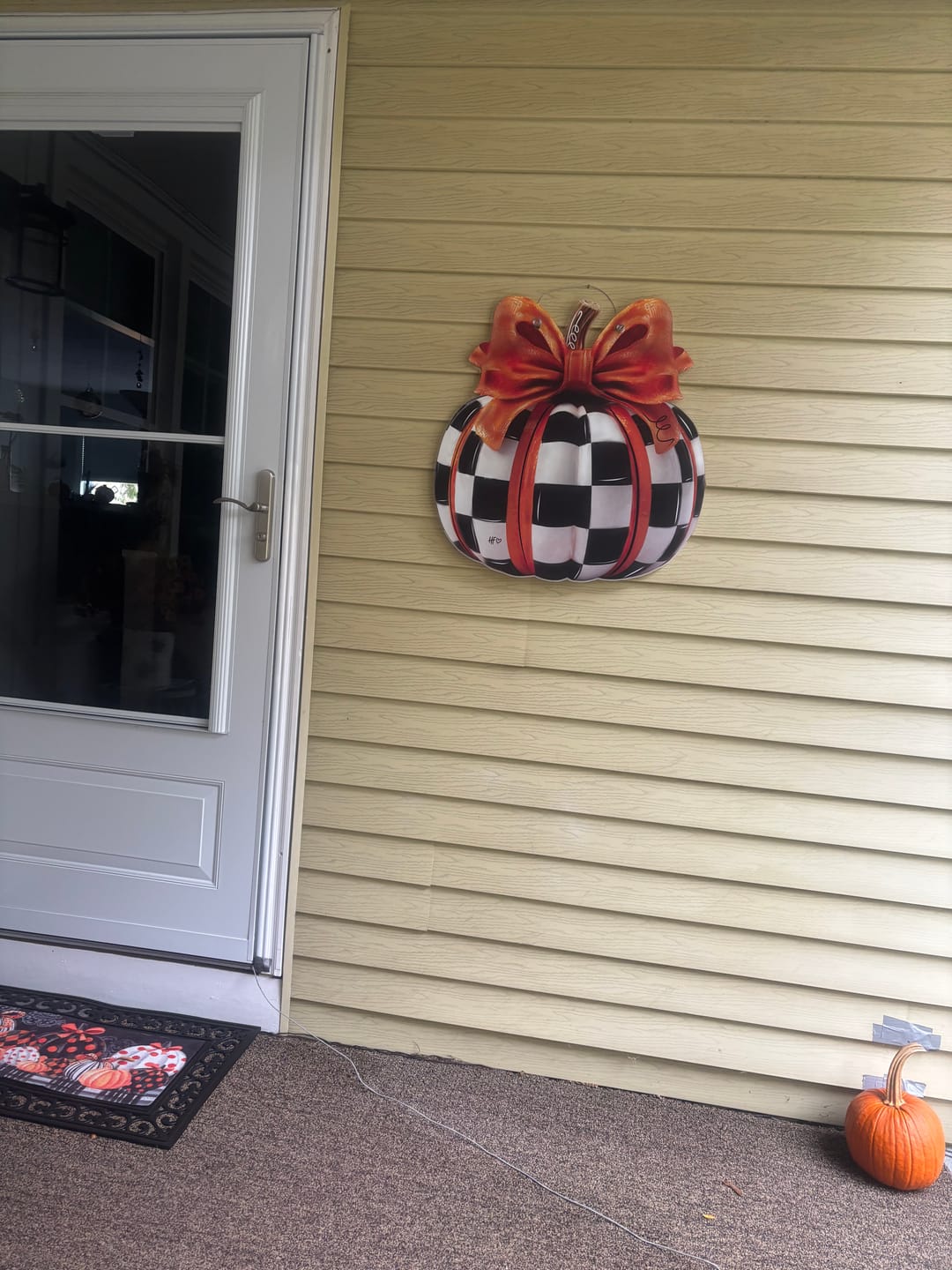 Customer photo review of Elegant Checkered Pumpkin Door Hanger