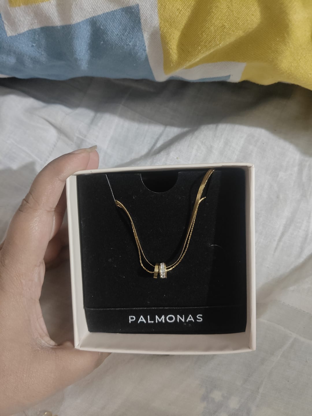 Customer photo review of Gilded Rings Layered Necklace
