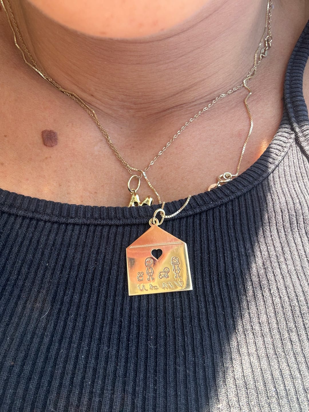 Customer photo review of Collana Casa Con Famiglia Componibile e Cuore traforato