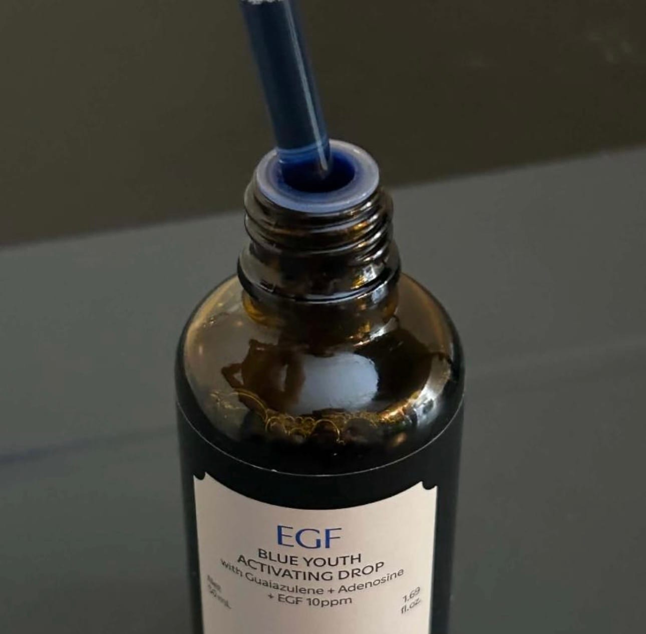 Customer photo review of EGF Blue Youth Activating Drop | EGF Peptide Serum