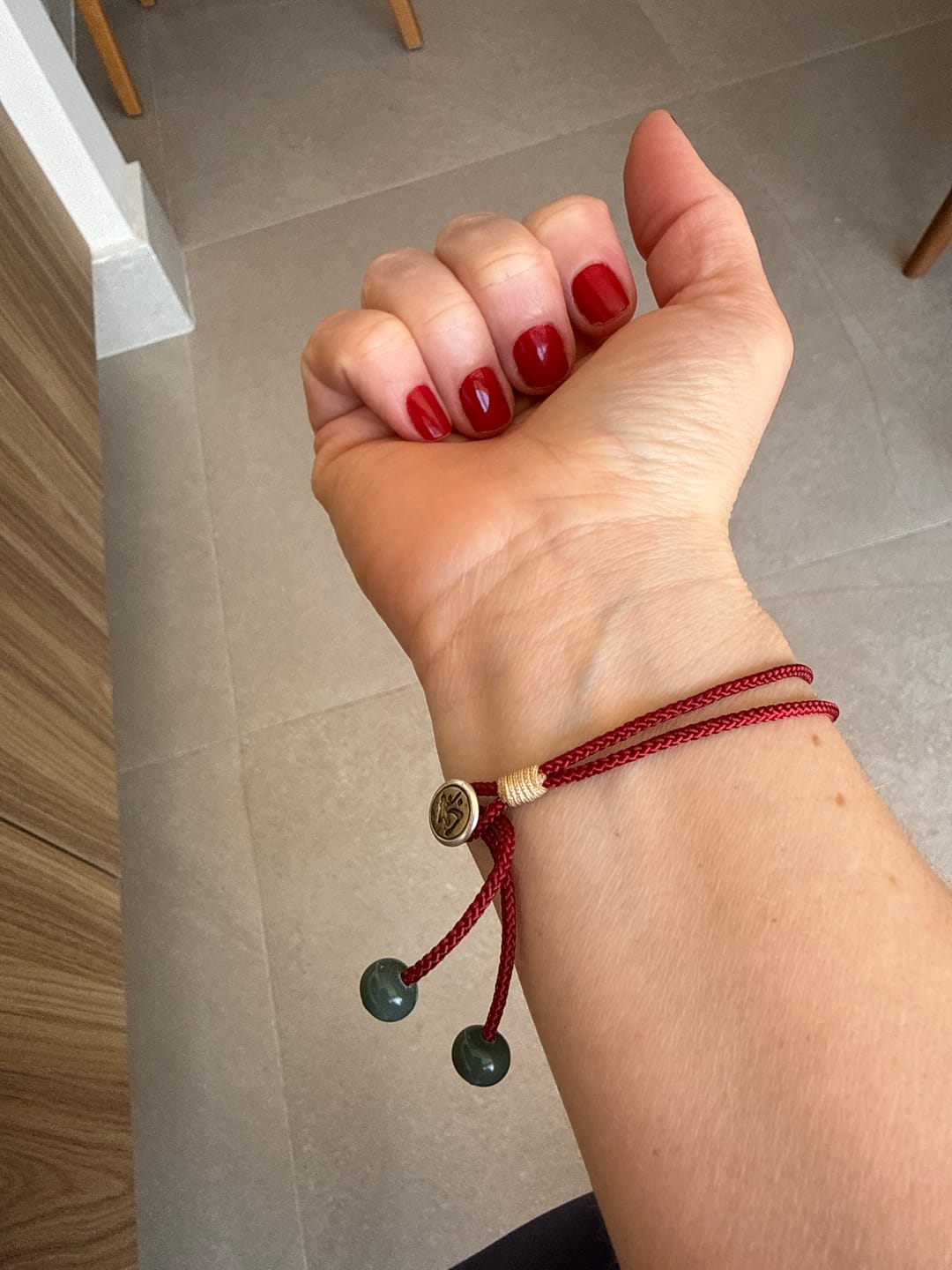 Customer photo review of Pulseira Tibetana da Proteção
