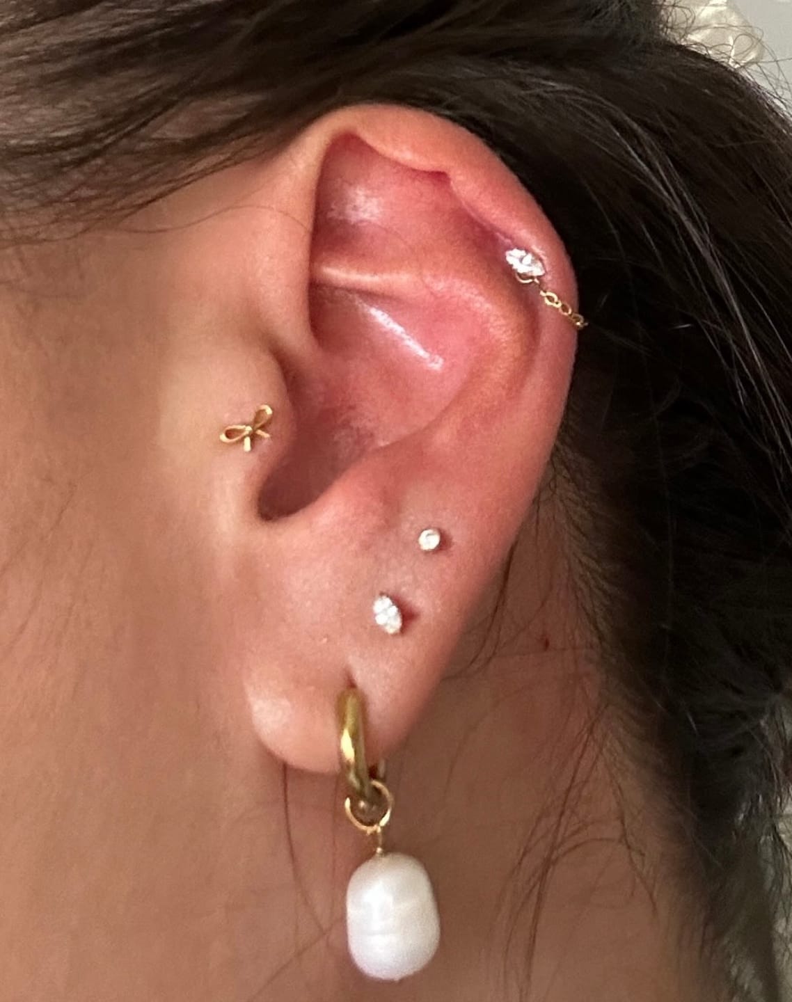 Customer photo review of Elegant Tie Piercing | Titan