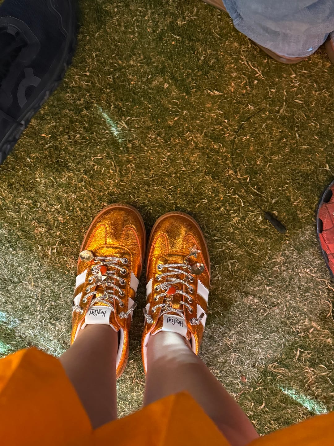Customer photo review of Corky's Orange Metallic Heads Up Sneakers