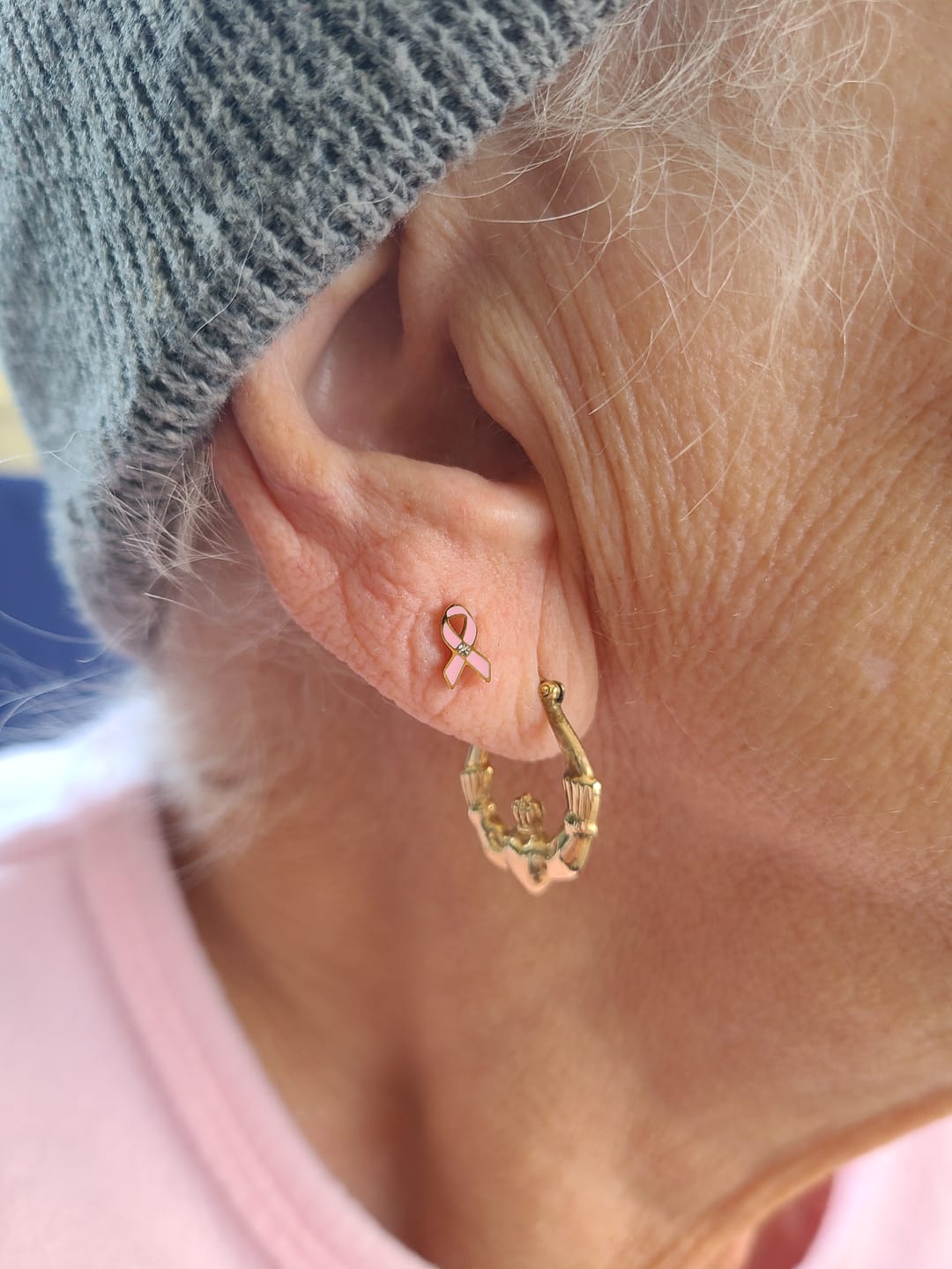 Customer photo review of Screwback Stud Earrings - Breast Cancer Ribbon