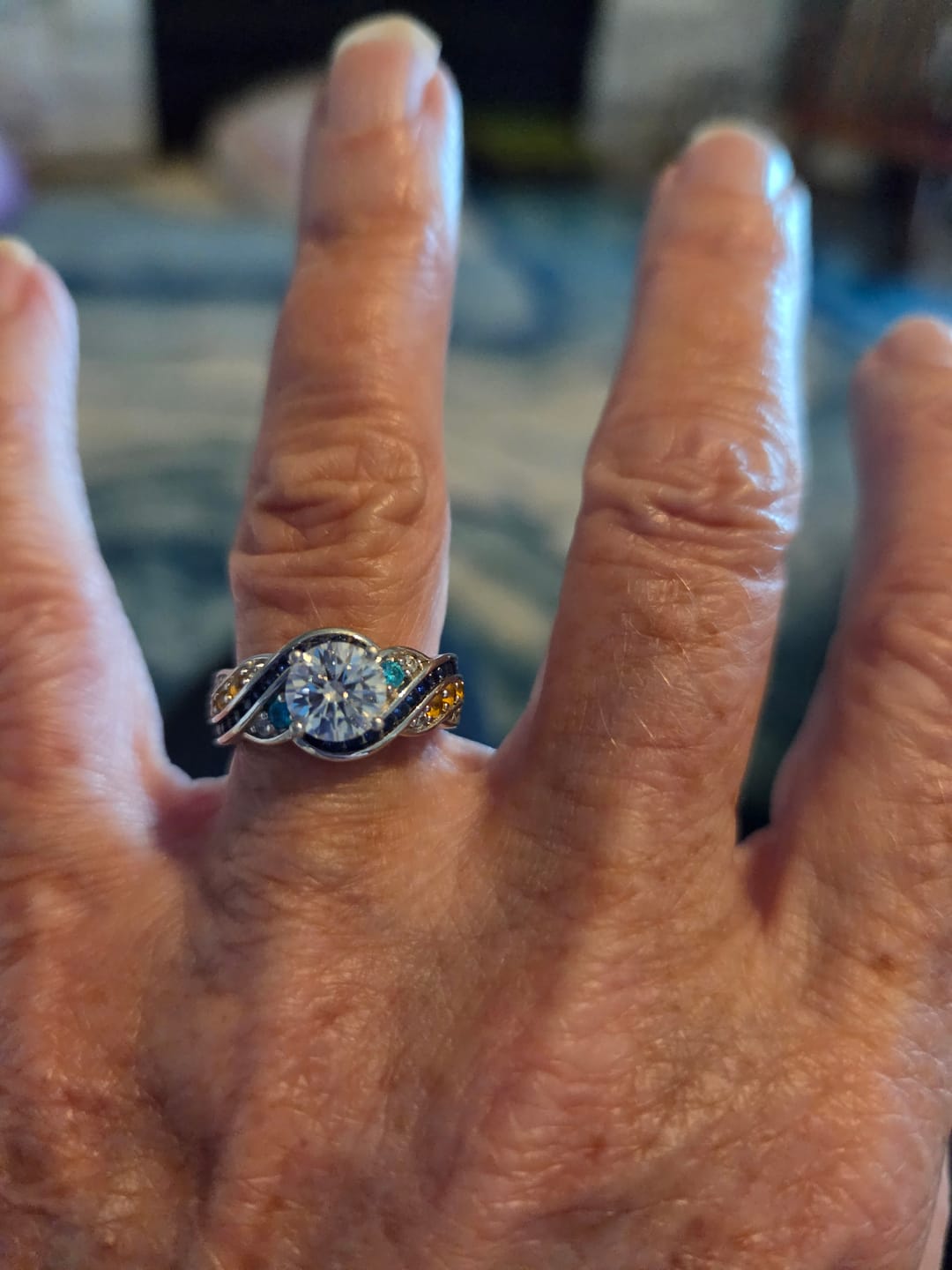 Customer photo review of Starry Night Moissanite Artistic Swirl Accent Engagement Ring