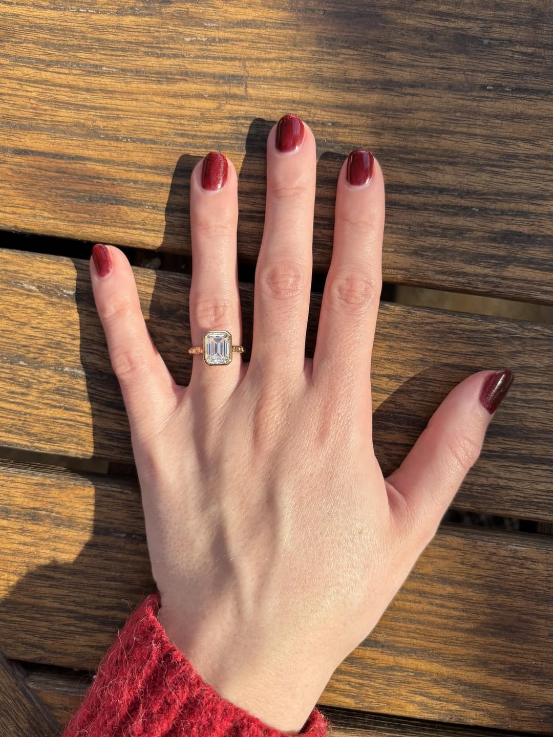 Customer photo review of Vivienne 2 Carat Emerald Cut Bezel Lab Grown Diamond Ring in 14K Yellow Gold