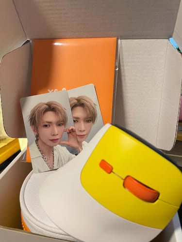 Customer's YEOSANG ALWAYS WITHIN REACH mouse and two photo cards inside the product packaging box