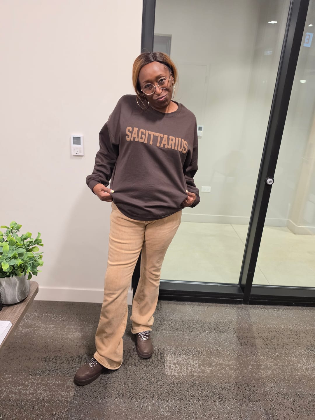 Customer photo review of Chocolate Zodiac Puff Print Crewneck