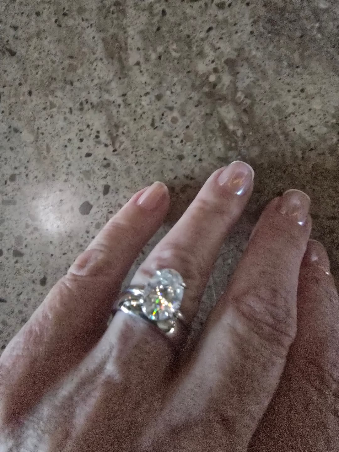 Customer photo review of Moissanite 4.0Ct Solitaire Oval Cut Engagement Ring with Plain Wedding Band