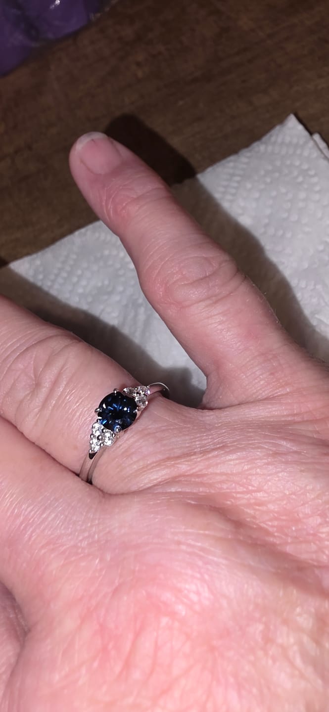 Customer photo review of Colored Round Moissanite Side Stone Engagement Ring