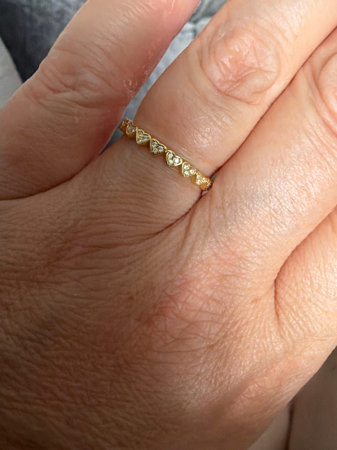 Customer photo review of Moissanite Heart Half Eternity Ring | 18K Gold Slimline Dazzle