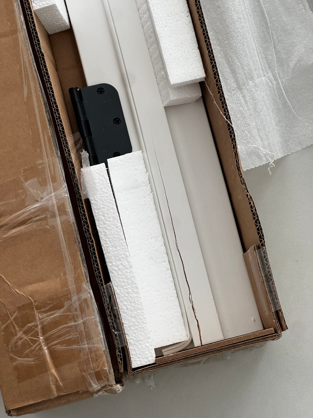 Customer photo review of TENONER White Double Door Jamb Frame Kit Including Latches And Door Handles